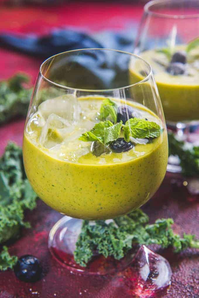 Mango Kale Smoothie served in a glass.