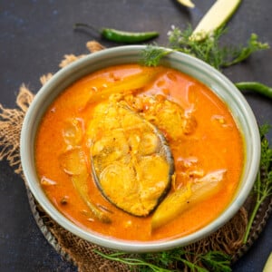 Alleppey Fish Curry is a spicy Kerala-style fish Curry that is slightly tangy due to the use of raw mangoes or tamarind. Here is how to make it.