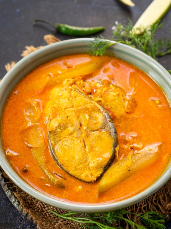 Alleppey Fish Curry is a spicy Kerala-style fish Curry that is slightly tangy due to the use of raw mangoes or tamarind. Here is how to make it.