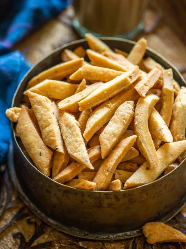 Namak Para (Plural - Namak Pare) are deep-fried diamond-shaped Indian crackers that are a tea-time staple. Make them using my easy recipe.