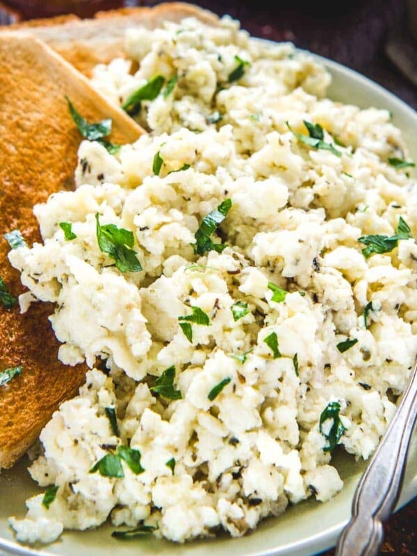 Egg White Scramble is a healthy, fluffy, and delicious option for breakfast. Serve it with some toast and fruits and milk on the side. Here is how to make the best fluffy scrambled egg white recipe at home!