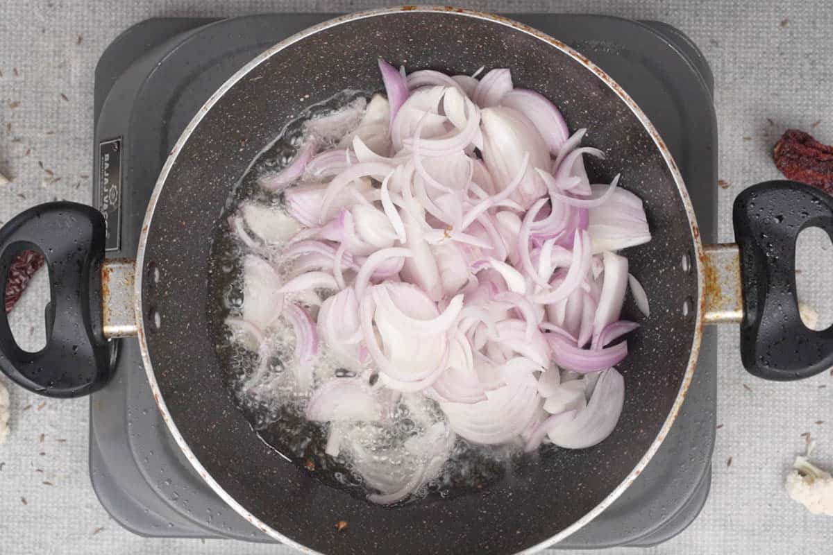 Onions added to the pan.