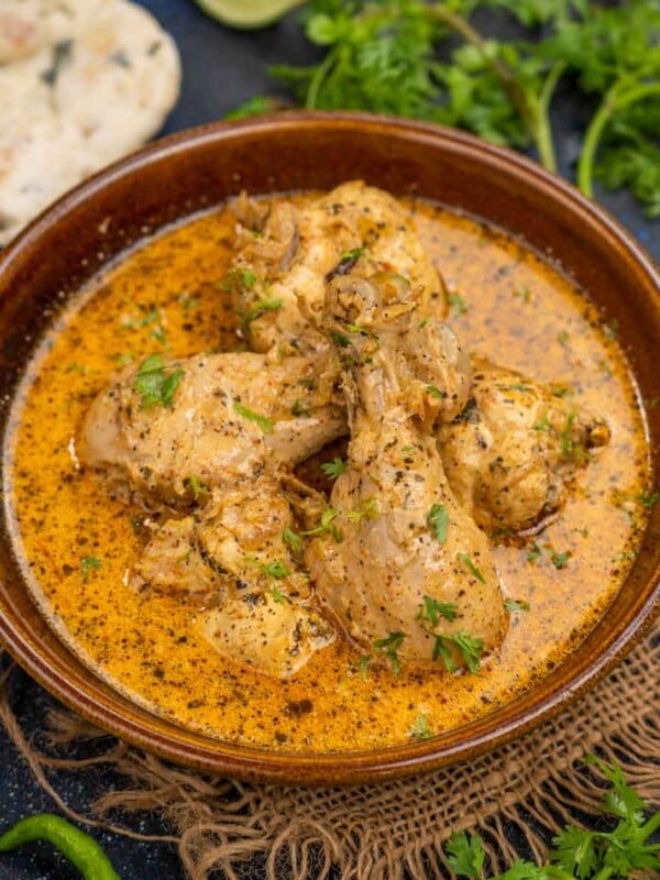 Malai Chicken Curry (Murgh Malaiwala) is a rich and creamy chicken curry where chicken pieces are cooked with heavy cream, yogurt, and spices. Serve it with naan or lachha paratha for an indulgent meal (gluten-free).