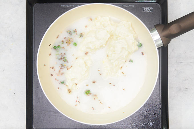 Flour mixture, water and salt added in the pan.