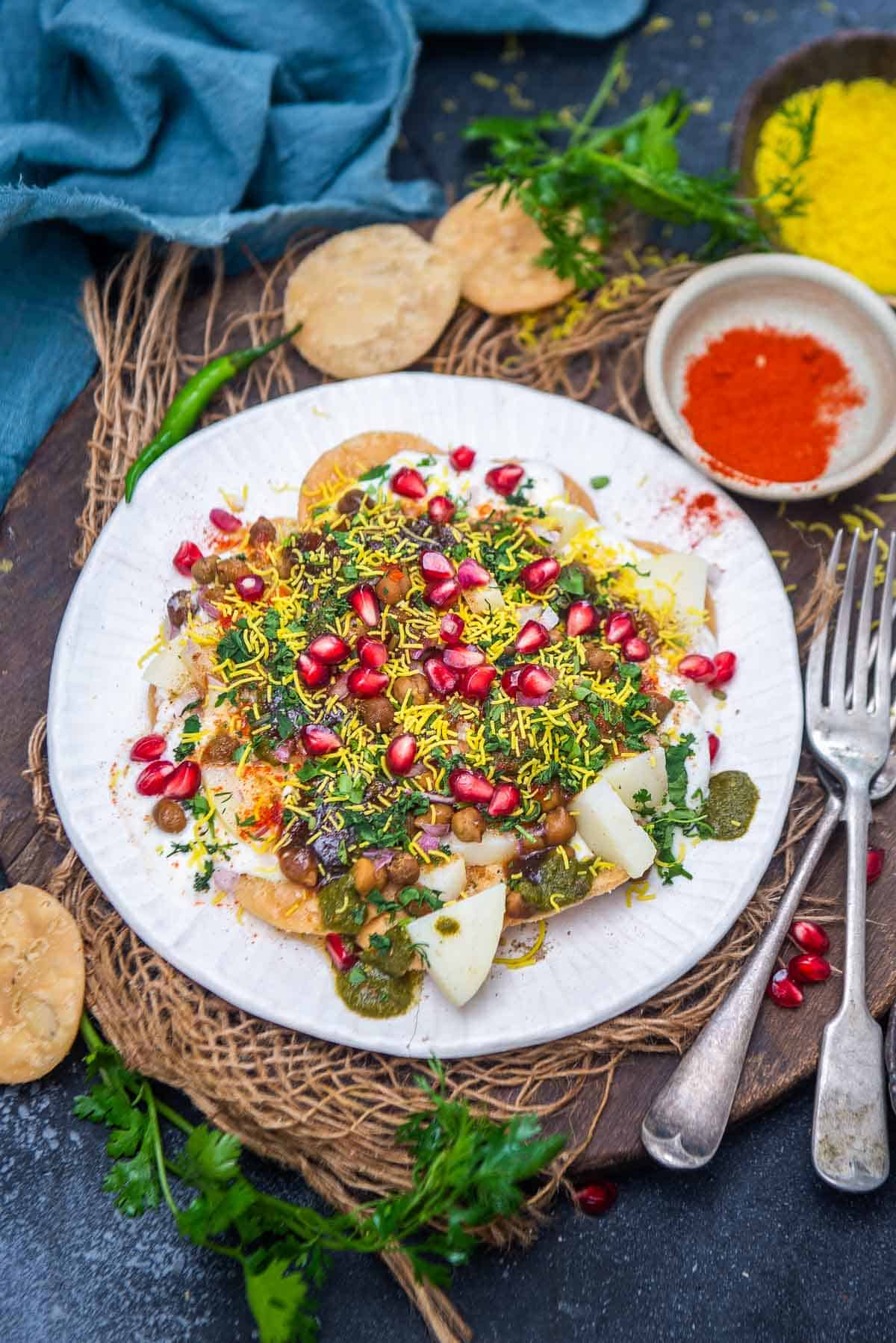 Papdi chaat served on a plate.