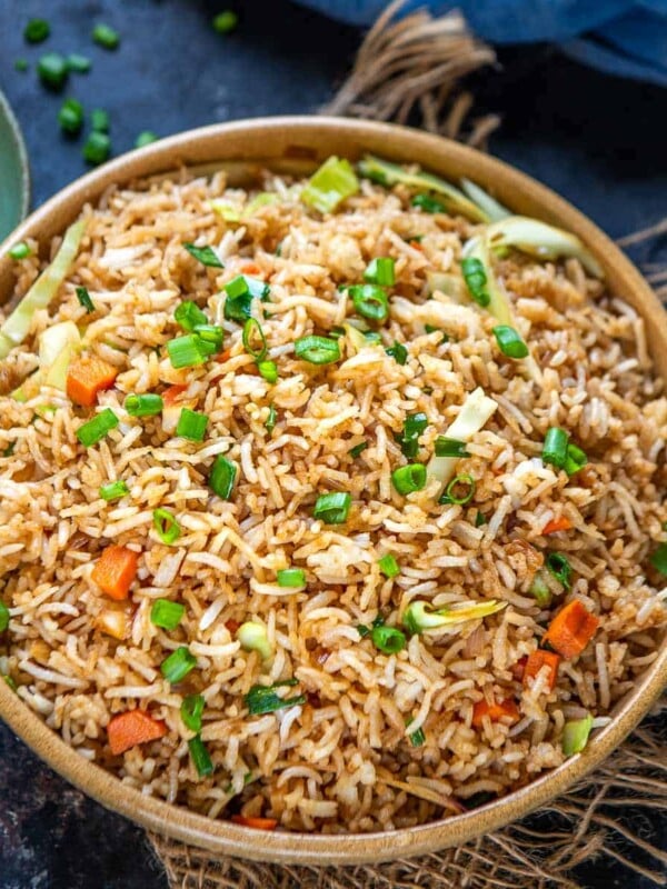 Make this Chinese Takeout Copycat Vegetable Fried Rice at home in under 30 minutes using simple ingredients. It is quick, easy to make, and customizable. Serve it as a side dish or a main course (vegan, can be easily made gluten-free).