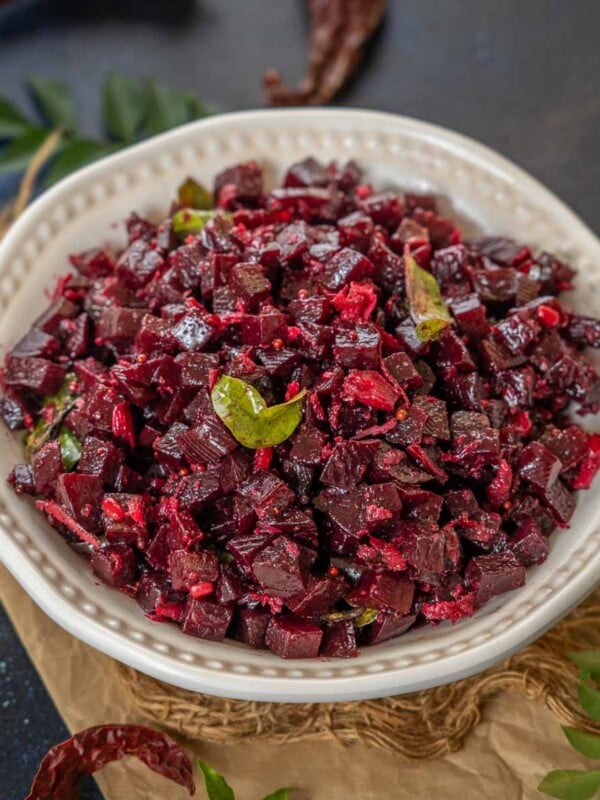 Beetroot Poriyal is a nutritious South Indian style beetroot stir fry made using beetroots, a few spices, and fresh coconut. Make this traditional poriyal using my easy recipe (vegan, can be easily made gluten-free).