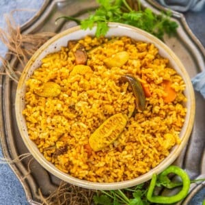 This spicy and packed with delicious flavors Maharashtrian Masale Bhat is perfect comfort food that comes together in under 30 minutes. Make this traditional one-pot, vegan and gluten-free dish using a medley of vegetables and hot spice mix - Goda Masala.