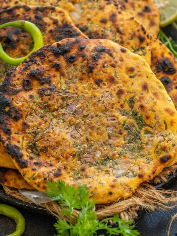 Missi Roti is a spicy North Indian flatbread prepared with chickpea flour and spices. It is very popular in Punjab and Rajasthan and is made especially during winter. Make it using my easy recipe (vegan).