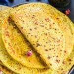 Puran Poli Sweet (Pooran Poli) is a traditional Indian sweet dish (Maharashtrian) made using whole wheat flour dough stuffed with a sweet lentil filling. Serve it with a dollop of ghee and milk on the side for a delicious breakfast, snack, or dessert (vegetarian).