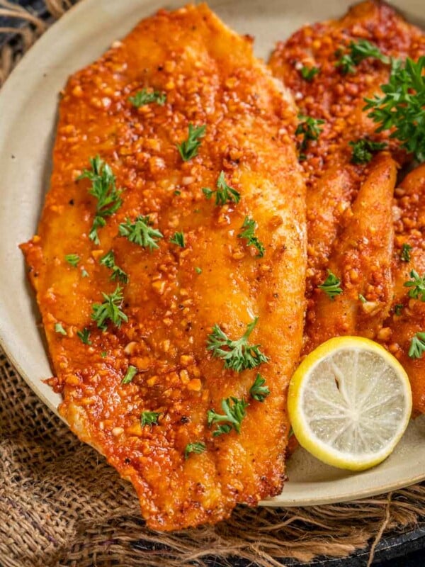 Spicy Baked Basa With Lemon And Garlic is a 30 minutes quick dinner made with Basa fish fillets and a few other simple ingredients. It's low-carb, keto-friendly and bursting with flavors.