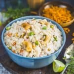 Upma is a delectable South Indian breakfast dish. Rava Upma is made by continuously stirring roasted semolina (Sooji) with spices, veggies, green chillies and curry leaves on a medium flame with hot water. Sprinkle lemon juice on it and enjoy it hot. It makes for a great lunch box option as well. Here is how to make Upma Recipe (Step by Step).