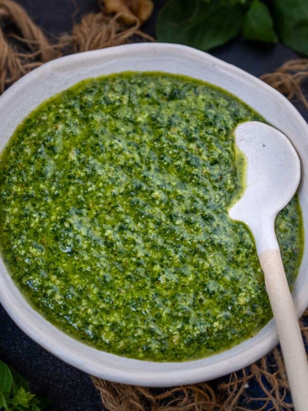 Basil walnut pesto served in a bowl.