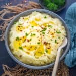 Make these super creamy Instant Pot Garlic Mashed Potatoes in under 50 minutes. This recipe is one pot with no drain, and the potatoes are melt-in-your-mouth soft and fluffy (vegetarian, gluten-free).