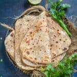 Ajwain Paratha (Carom Seeds Flatbread) is an unleavened Indian flatbread prepared with whole wheat flour, carom seeds (ajwain), salt, and ghee. It is best served for breakfast with tea or coffee.