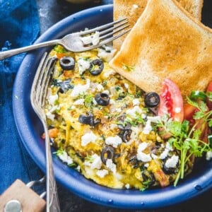 A classic Greek egg recipe loaded with spinach and feta cheese, Greek Omelette suits perfectly for fancy breakfast or brunch! Here is how to make a Greek-Style Omelette Recipe with Feta Cheese.