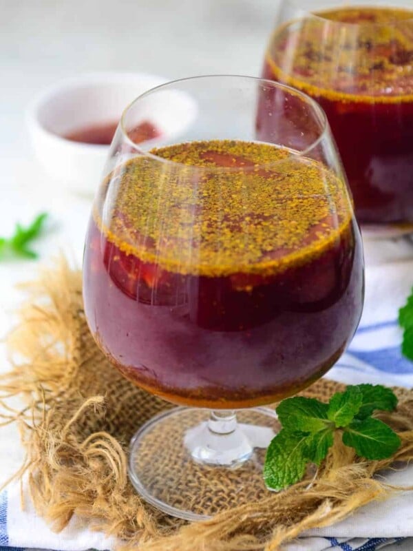 Kanji Drink is a traditional North Indian probiotic drink that is made by fermenting carrots in water and spices. It comes together in under 15 minutes of prep time (vegan, gluten-free).