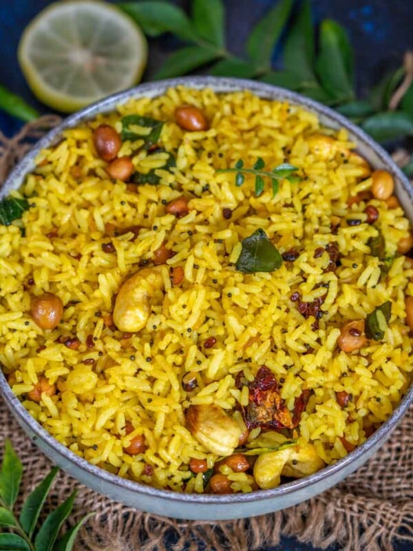 Lemon Rice (Chitranna) is a popular South Indian rice preparation where cooked rice is flavored with lime juice and a few other simple ingredients. Try my easy recipe here.