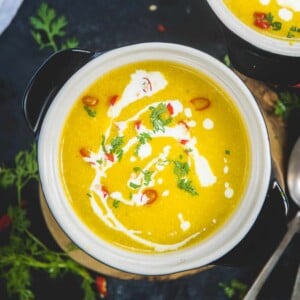 Velvety creamy with warm and cozy fall flavors, this Pumpkin Curry Soup is super easy to make and can be done in under 20 minutes. It is naturally gluten-free, vegan, dairy-free and the recipe is very flexible.