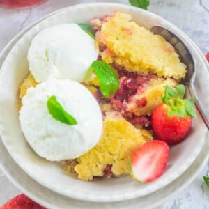 Strawberry Cobbler is easy to make classic Southern dessert made using fresh strawberries. It takes all of 6 simple ingredients and 15 minutes to put it together and makes for a great party dessert. Here is how to make it.