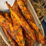 Crispy outside, creamy inside, and lightly spiced, these oven-roasted sweet potato wedges make for a healthy appetizer, snack, or side dish (vegan, gluten-free).