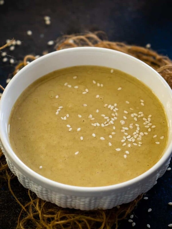 This Easy Homemade Tahini Paste (Tahina) uses just two ingredients. It is much more economical and way better than store-bought. Make a big batch and refrigerate it for up to a month, or freeze it for 3-4 months (vegan, gluten-free).