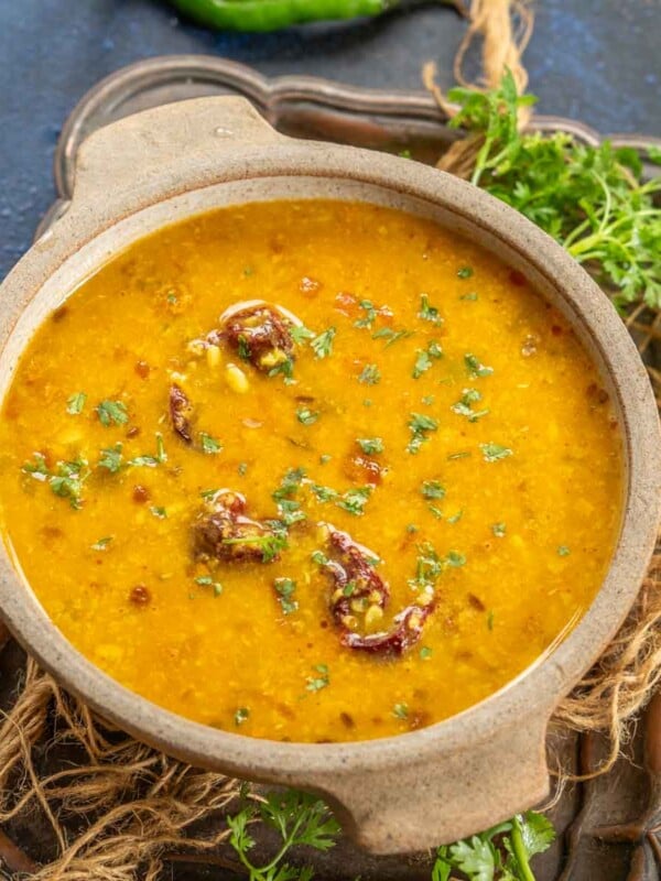 Make North Indian style White Urad Dal (Dhuli Urad Dal) using my easy recipe and serve it for everyday Indian-style meals. You can make this recipe in a traditional pressure cooker or in an instant pot (vegetarian).