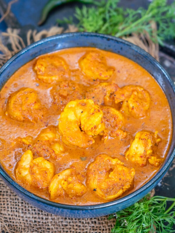 Goan Shrimp Curry (Goan Prawn Curry) is a robust shrimp curry made in Goan style. Make it at home using my traditional recipe.