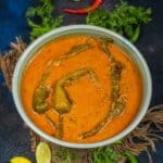 Mirchi Ka Salan is a Hyderabadi-style nutty and spicy curry made using large green chilies. Serve it with biryani or any Indian bread (vegan, gluten-free).
