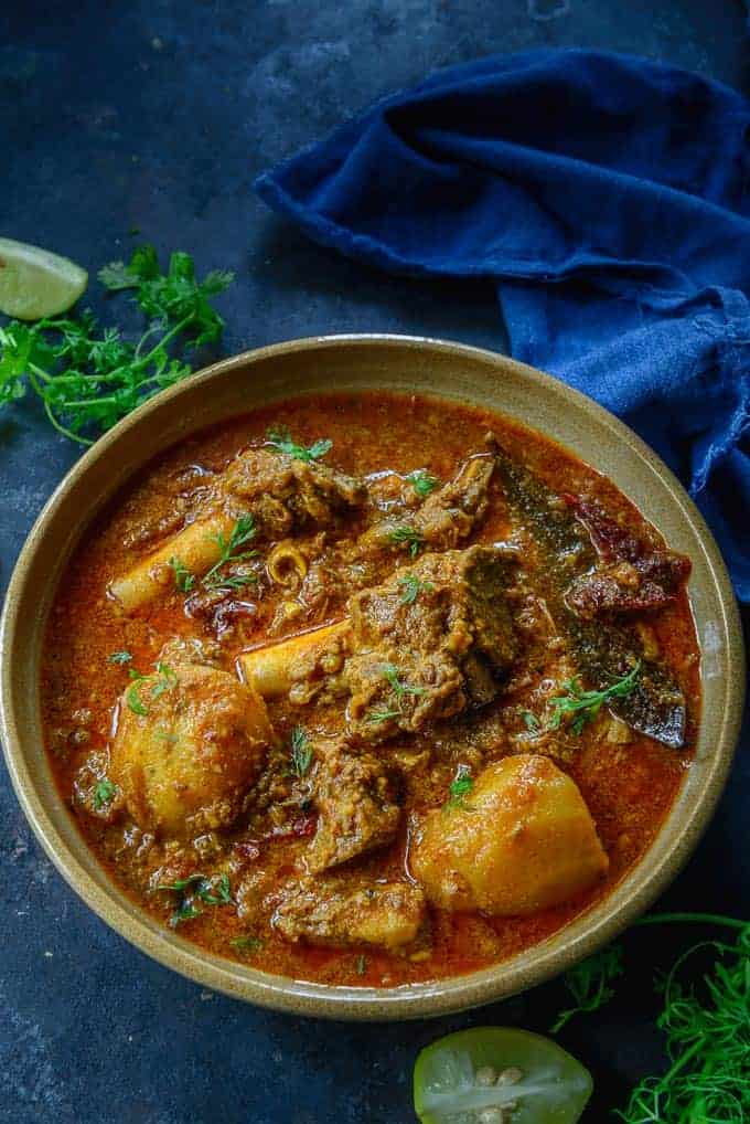 Punjabi Mutton Curry served in a bowl.