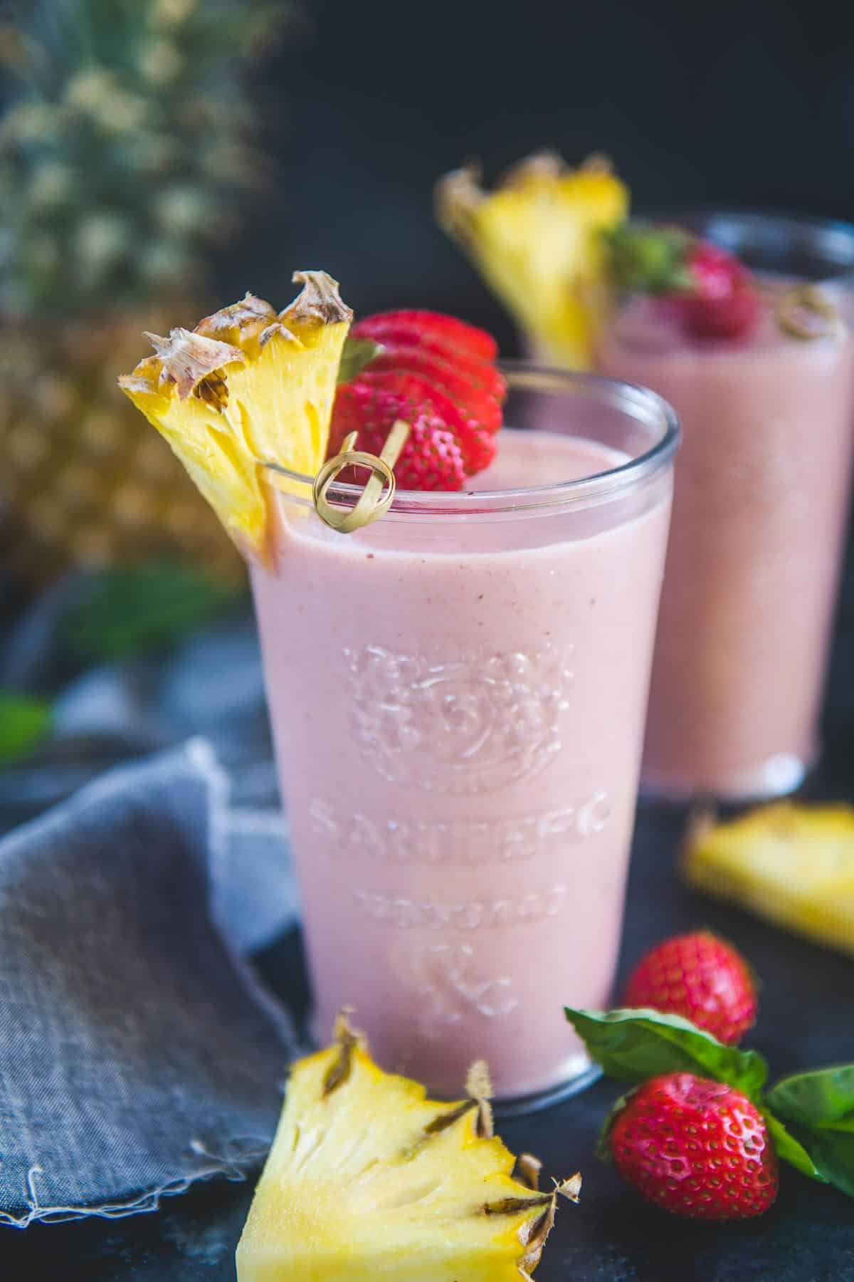 Strawberry Pineapple Smoothie served in a glass.