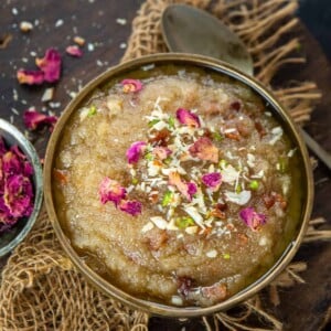 Rich, indulgent, super easy to make, that's Suji Ka Halwa you guys! It is Indian Semolina Pudding which can be made using three ingredients in just no time. Serve it for dessert or as breakfast.
