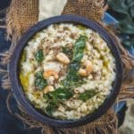 Ven Pongal (Khara Pongal) is a South Indian savory porridge made using rice and yellow moong lentils. It is served at temples as prasadam or made in homes for breakfast. Make this temple-style protein-packed dish in a traditional pressure cooker or instant pot (vegetarian, can be made gluten-free).