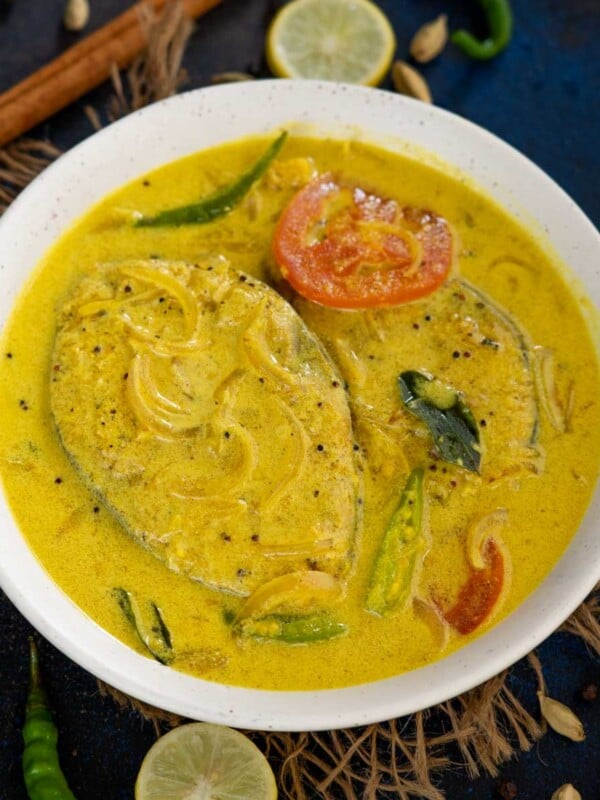 Kerala Style Fish Molee (Meen Molly, Kerala Fish Stew, Fish Moile) is a rich and creamy Kerala-style curry where fish is cooked in a subatly spiced coconut-based gravy. Serve it with appam or steamed rice for a hearty meal.