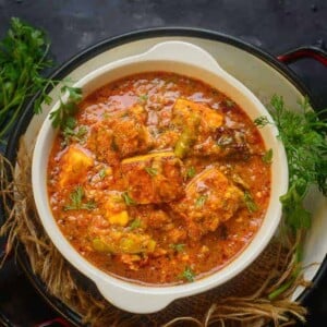 Paneer Masala is an easy to make dish of paneer where paneer cubes are simmered in an onion tomato based spicy gravy. It can be paired with Indian bread or Jeera Rice. Here is how to make Paneer Masala Gravy at home.