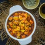 Rajasthani Aam ka Achar is a spicy and tangy Indian style pickle where raw mango pieces are preserved in oil and spices. My mom makes the best pickle and I am sharing her recipe with you all. Here is how to make Rajasthani Mango Pickle.