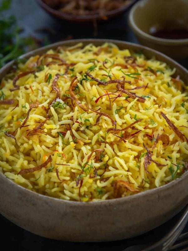 Steamy, filling, and very aromatic, Persian Saffron Rice is prepared using white rice, caramelized onions, and saffron strands. It is a savory side dish with a pleasant yellow color that comes together in under 30 minutes. Here is how to make it.