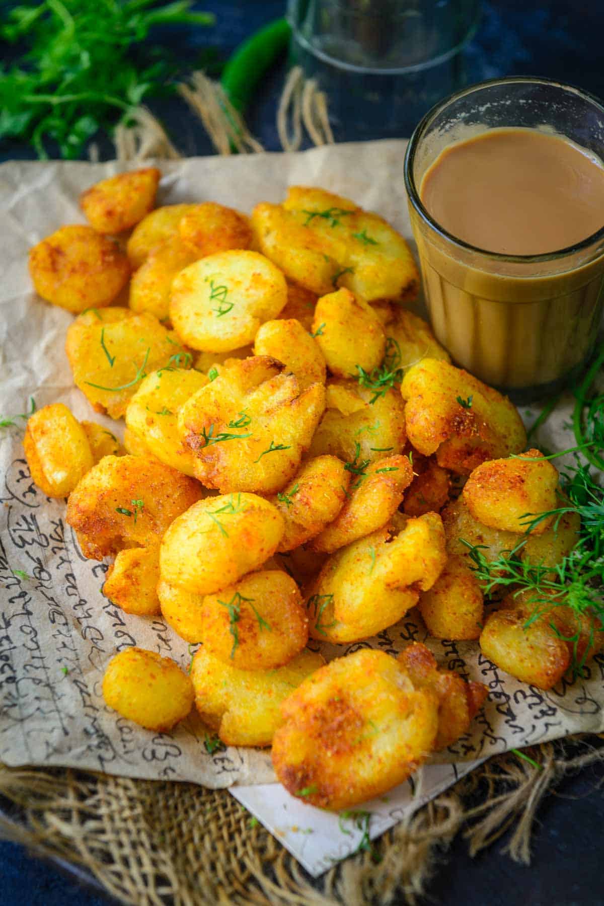 Sindhi aloo tuk served on a plate.