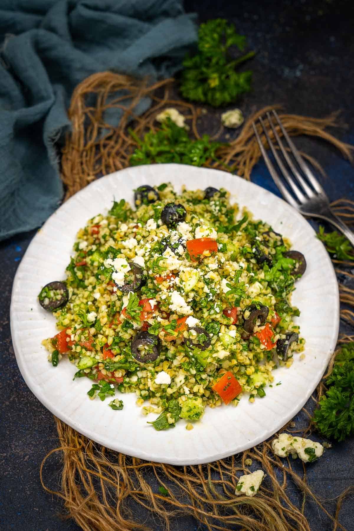 Tabouli salad served on a plate.