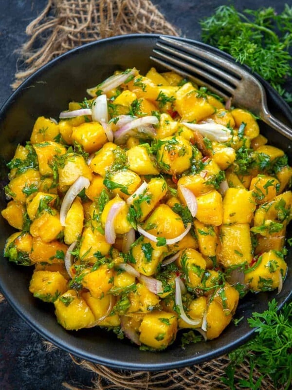Malaysian Mango Salad is a delicious salad that takes under 10 minutes to come together. Munch on this healthy salad while mangoes are in season. Here is how to make it.