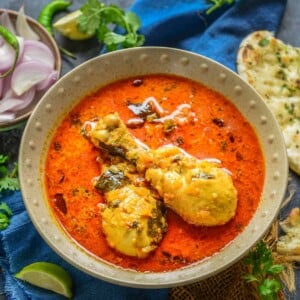 This Creamy Coconut Curry Chicken is an Indian curry dish made using chicken pieces, coconut milk, and spices. Do try this Indian chicken curry recipe with Naan or Steamed Rice for a delectable meal. Here is how to make it.