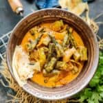 Dahi Bhindi is Okra cooked in a yogurt gravy. It is easy to make and goes well with any Indian bread. Here is how to make Dahi Bhindi Recipe.