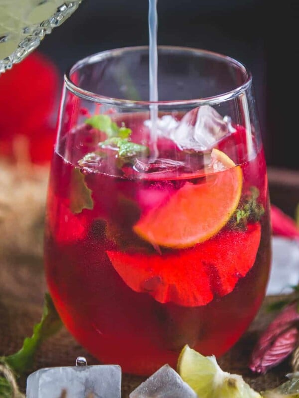 Hibiscus Tea also is known as Karkade Tea or Jamaica Tea is a refreshing and super healthy beverage made using fresh or dried Hibiscus Flowers. This agua fresca is considered a superfood and when drank in a moderate amount has amazing benefits to the body. Here is how to make it.