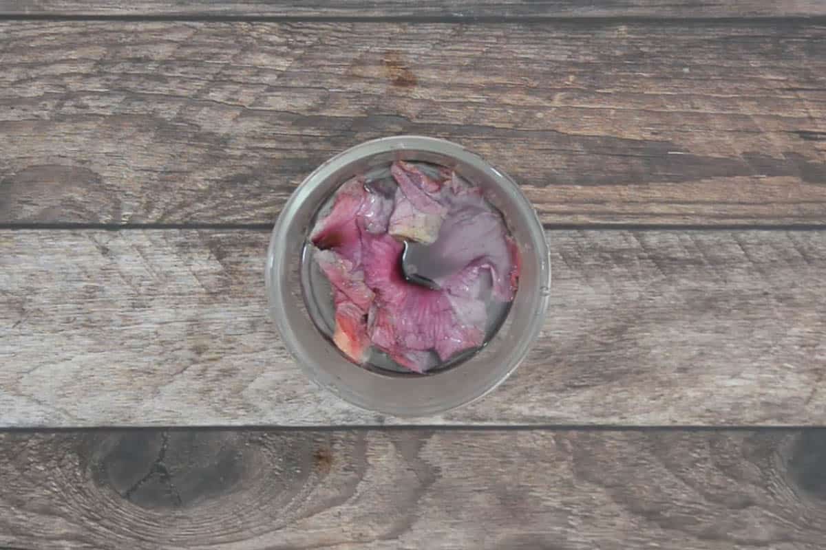 Boiled water poured over the hibiscus flowers.