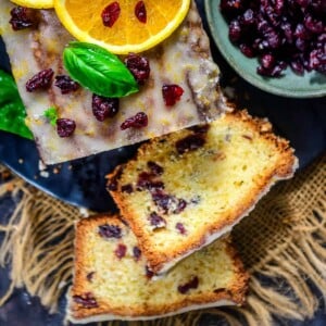 This easy homemade Cranberry Orange Bread is a super moist and crumbly quick bread that you can make this festive season. Follow my recipe and make a loaf for yourself.