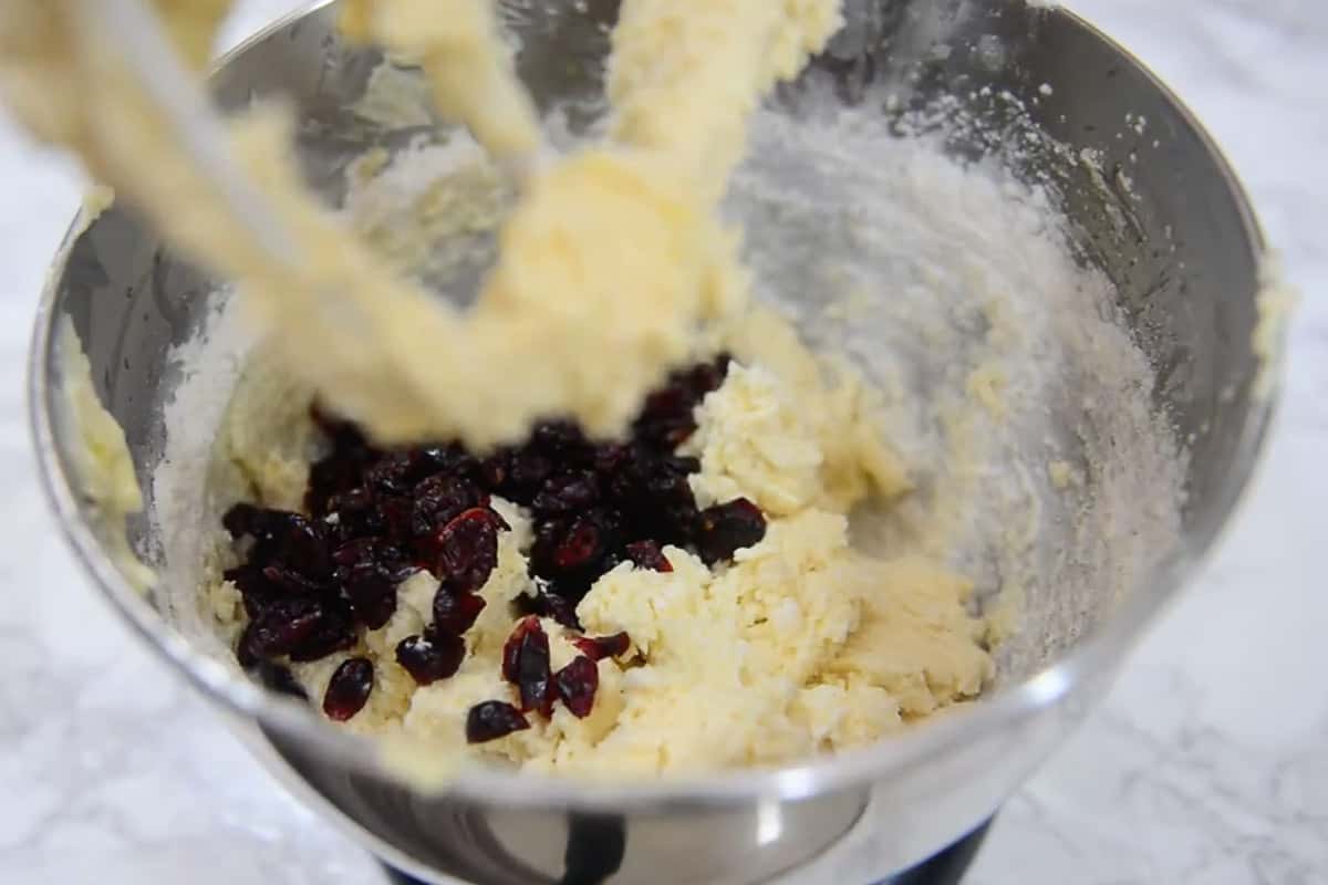 Dried cranberries folded in the batter.