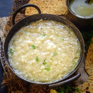 Bajre Ki Khichdi or Bajra Khichdi is a delicious, warming, and nutritious recipe from Rajasthan which is made using bajra or pearl millet, rice, and lentils. It is a wholesome dish that is a winter favorite. Here is how to make it.