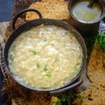 A delicious, warming, and nutritious recipe from Rajasthan, Bajra Khichdi (Bajre Ki Khichdi, Pearl Millet Khichdi) is made using bajra (pearl millet), rice, and lentils. It is a wholesome dish that is a winter favorite (vegetarian, can be easily made vegan or gluten-free).