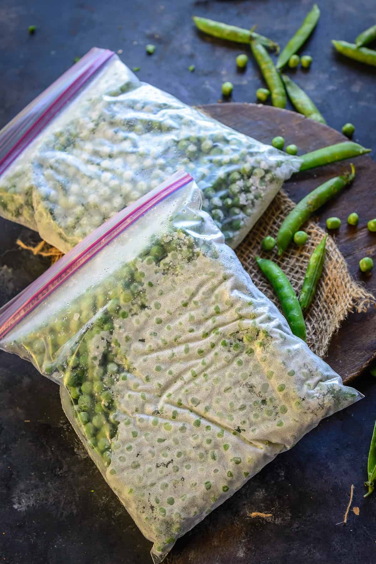 Frozen peas kept in a zip lock bag.