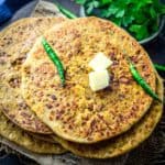 Keema Paratha is an Indian flatbread where the spicy and flavourful minced mutton mixture is stuffed into a whole wheat flour dough and then rolled to make a delicious paratha. Here is how to make it.